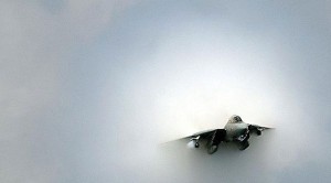 Badass F-14 Tomcat Pilot Plows Right Between Two Ships