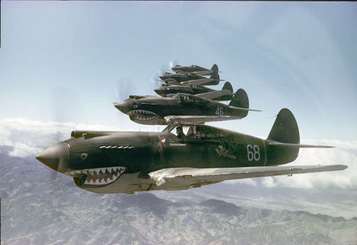The photograph of the Third Pursuit Squadron--Hell's Angels-of the American Volunteer Group was probably taken from aircraft #47 on May 28, 1942 near the Salween River Gorge on the China-Burma border. The shot of P-40 Tomahawks includes #68 flown by Arvid Olson, #46 flown by Bob Prescott, #49 flown by Tom Hayward, #24 flown by Ken Jernstedt, and #74 flown by Bill Reed.
