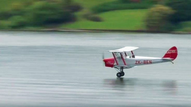 Old Biplane Water-skis On Lake Surface | World War Wings Videos