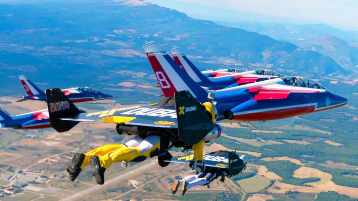 Jetpack Daredevils Race Against Air Force | World War Wings Videos