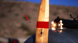Firing Bullets Between Propeller Blades At 120K Frames Per Second