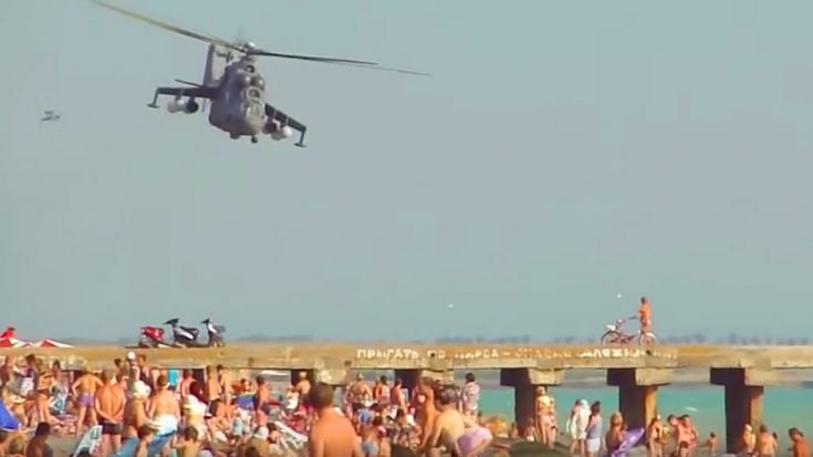 Insane Russian Pilot Bolting Dangerously Low Over Unsuspecting Beachcombers | World War Wings Videos