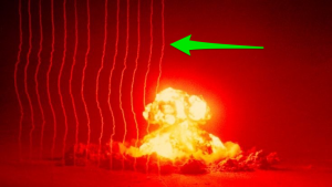 What Causes Those Smoke Stacks Next To Nuclear Explosions?