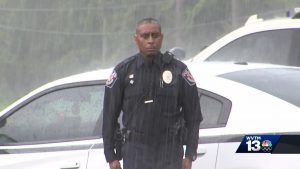 Alabama Officer Stands In Rain to Pay Respect to WWII Veteran