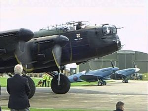 An Avro Lancaster starts up, taxies out, takes off and does a flyby