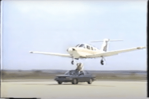 Mechanic Fixes Plane’s Landing Gear From A Moving Car