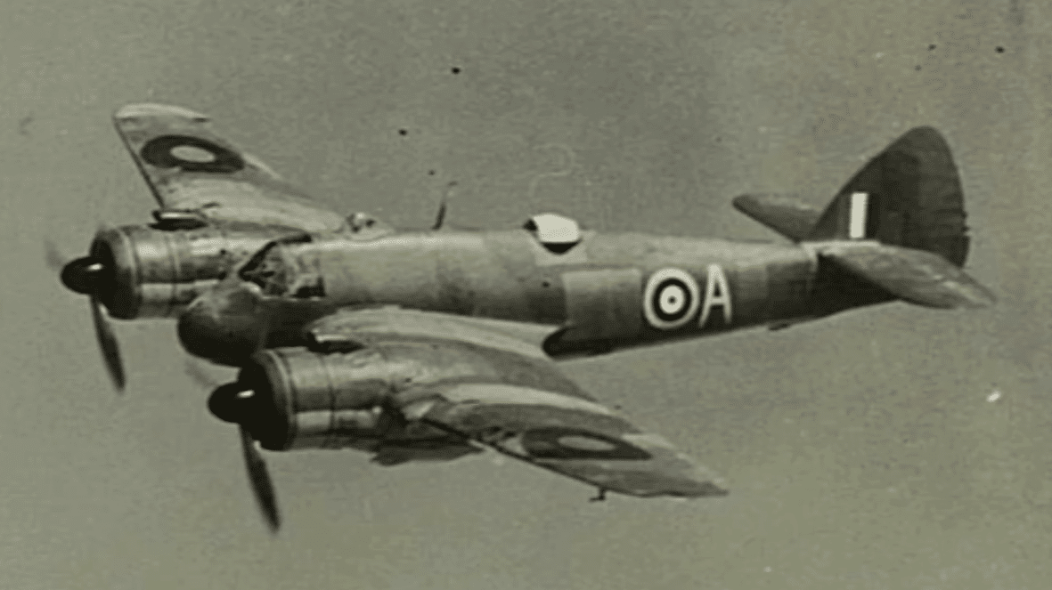 A single Bristol Beaufighter aircraft flying at an angle, displaying Royal Air Force roundels on its fuselage and wings.