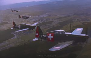 Colorized & Enhanced Footage of M.S.406 & B-24 Liberator Over Switzerland in WWII