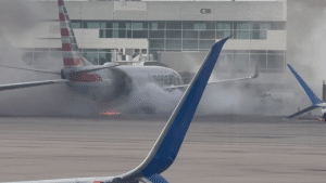 American Airlines Plane Catches Fire at Denver Airport, Forcing Wing Evacuation; 12 Injured