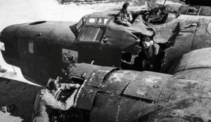The Incredible Story Behind the Famous Photo of a RAF Bomber Hit by Bombs and How They Survived