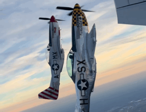 Watch Incredible Close-Up Video of Aerobatic Team Flies Three Legendary WWII P-51 Mustangs Together at the Geneseo Airshow