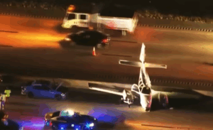 Watch: U.S. Plane Crash-Lands on I-95 in Brevard County, Hits Vehicle During Emergency Landing