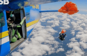 Watch Heart-Stopping Footage Shows Skydiver Dangling at 15,000 Feet After Parachute Snags Plane’s Tail