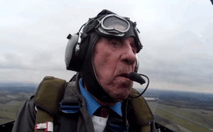 100-Year-Old WWII Pilot Allan Scott Takes to the Skies Again in a Hurricane—WATCH