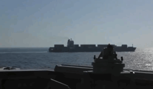 Watch: USS Spruance Fires 5-Inch Gun as Marines Board Iranian-Flagged Vessel